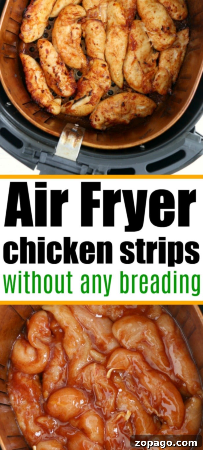 Juicy and tender air fryer chicken tenders no breading, showcasing their delicious barbecue coating. Close-up of perfectly cooked chicken strips in an air fryer basket, showing their tender texture.