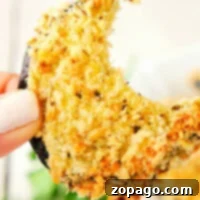 Crispy air fryer eggplant slices on a plate.