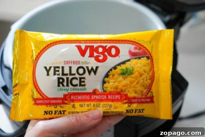 Ninja Foodi Pork Chops with Rice 5 Saffron yellow rice, uncooked, in its bag, ready to be added to the Ninja Foodi