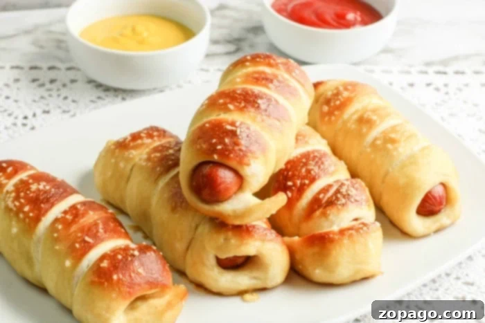 Homemade Auntie Annes Pretzel Dogs 6 A plate of freshly baked Auntie Anne's style pretzel dogs