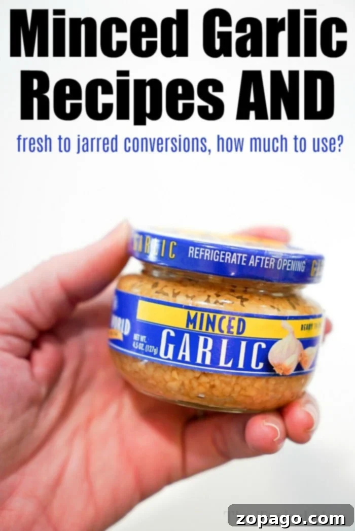 Mincing Garlic Cloves 2 A jar of minced garlic, ready for use in cooking, illustrating the convenience of pre-minced options for garlic conversions.