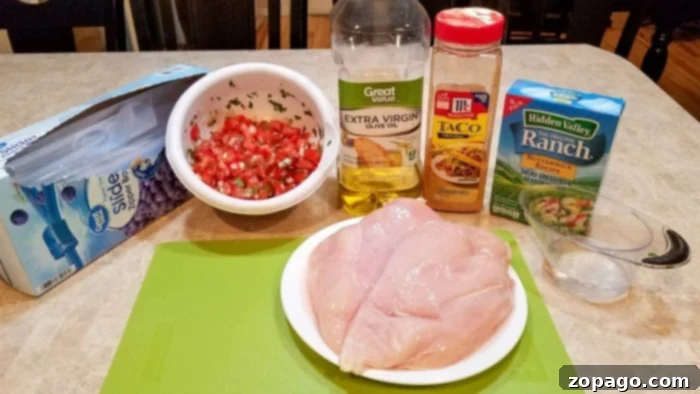 Slow Cooker Chicken Taco Filling 4 Close-up of shredded chicken in a slow cooker, ready for taco meat preparation.