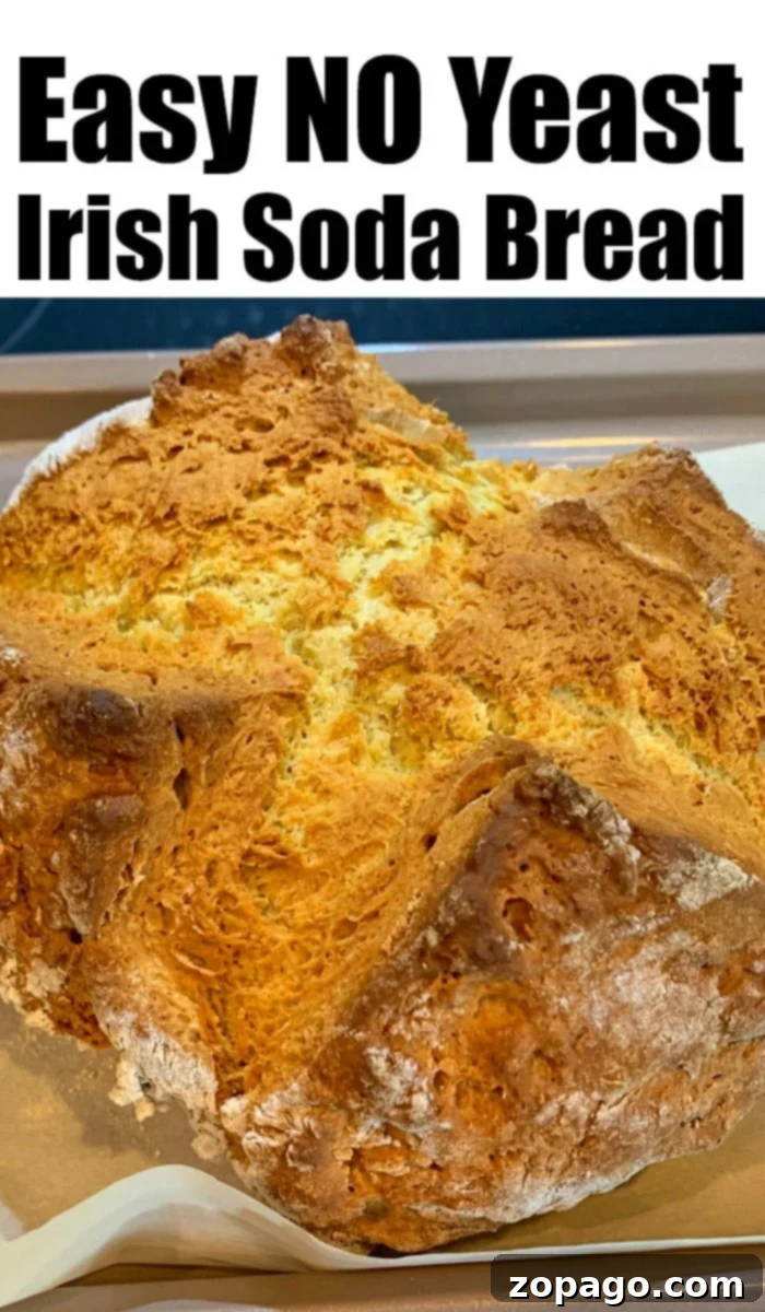Easy Irish soda bread recipe you can make with no yeast or kneading required. Great flavor to serve during St. Patricks Day or year round with dinner. Beautifully rustic and easy Irish soda bread, sliced and ready to be enjoyed with any meal.