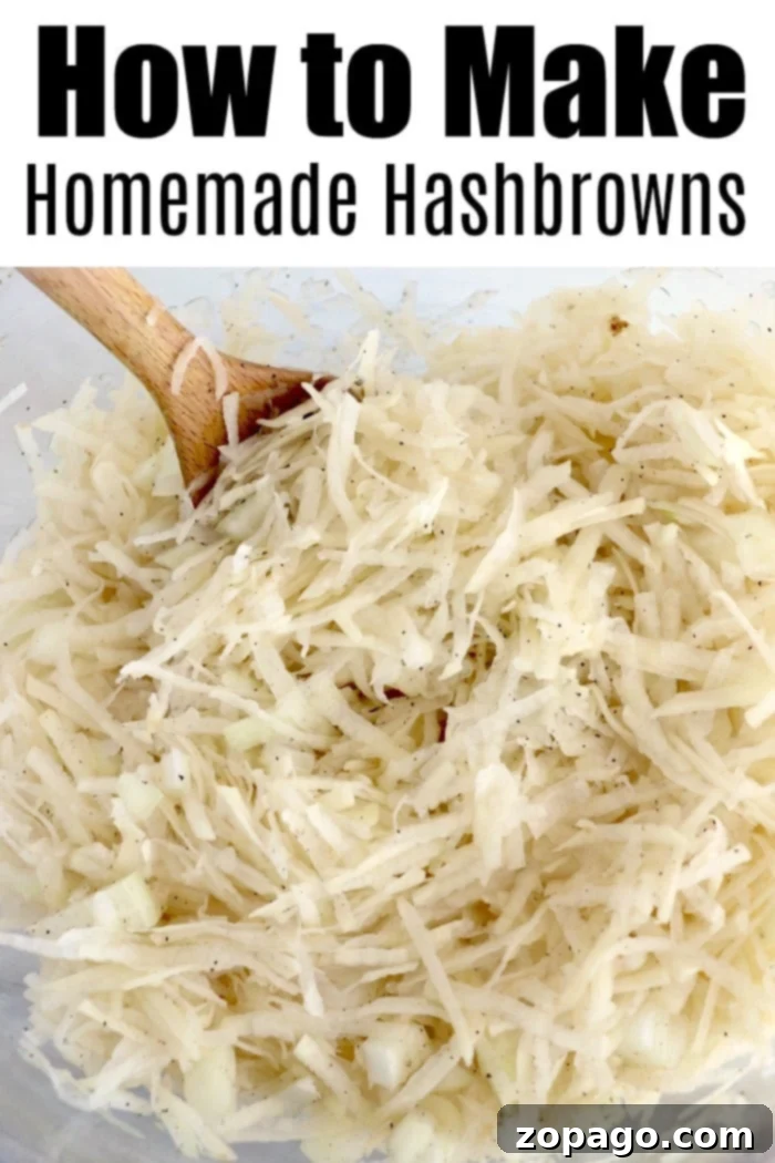 Freshly grated potatoes being dried with paper towels