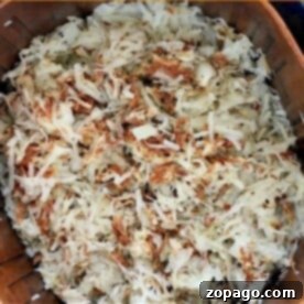 A basket of crispy, golden-brown air fryer hash browns cooked to perfection.