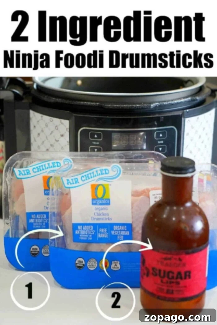 Ultimate Ninja Foodi Barbecue Drumsticks 4 Perfectly cooked Ninja Foodi drumsticks coated in barbecue sauce, ready to be served.