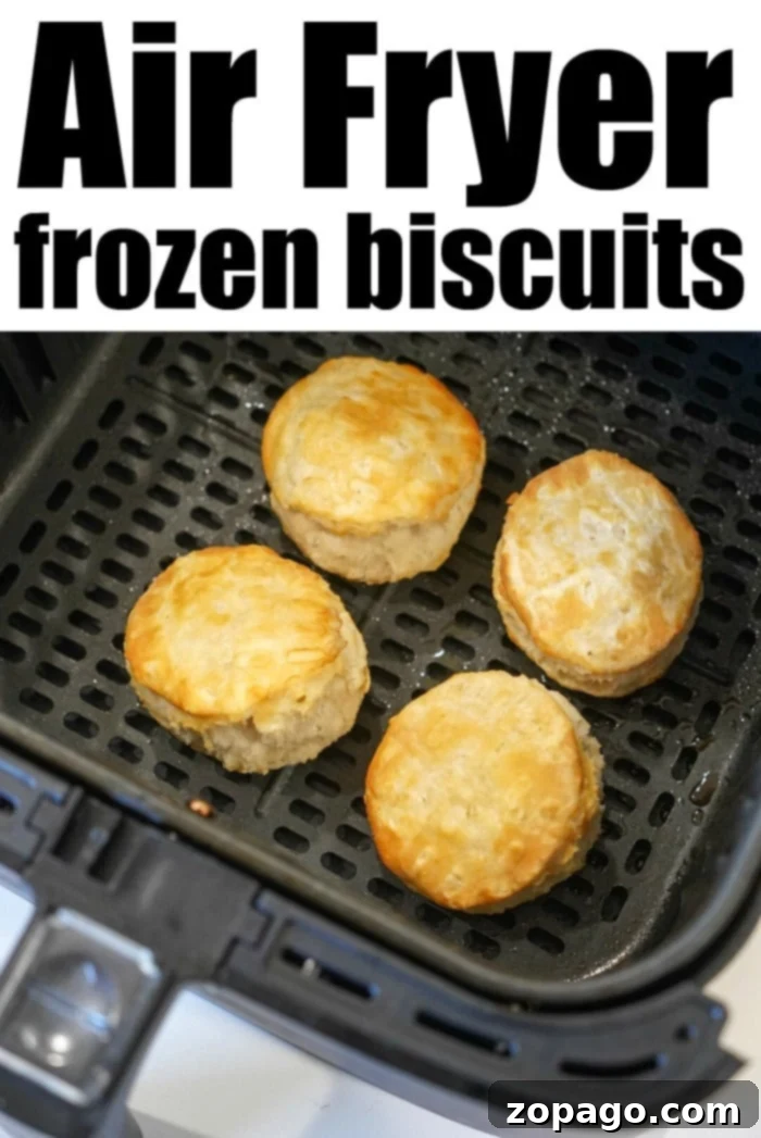Air Fryer Frozen Biscuits: Golden Perfection 9 A selection of warm, fluffy air fryer Grands biscuits on a cooling rack, ready for butter or jam.