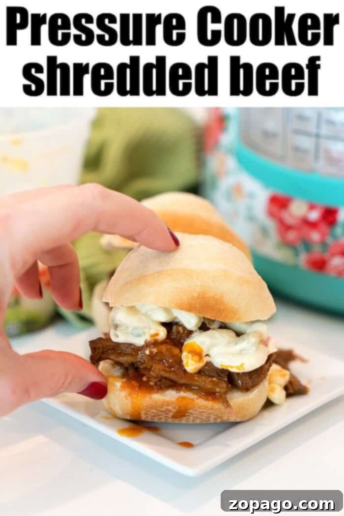 Tender Instant Pot BBQ Beef 11 Pressure cooker shredded beef - versatile and delicious for endless meal possibilities