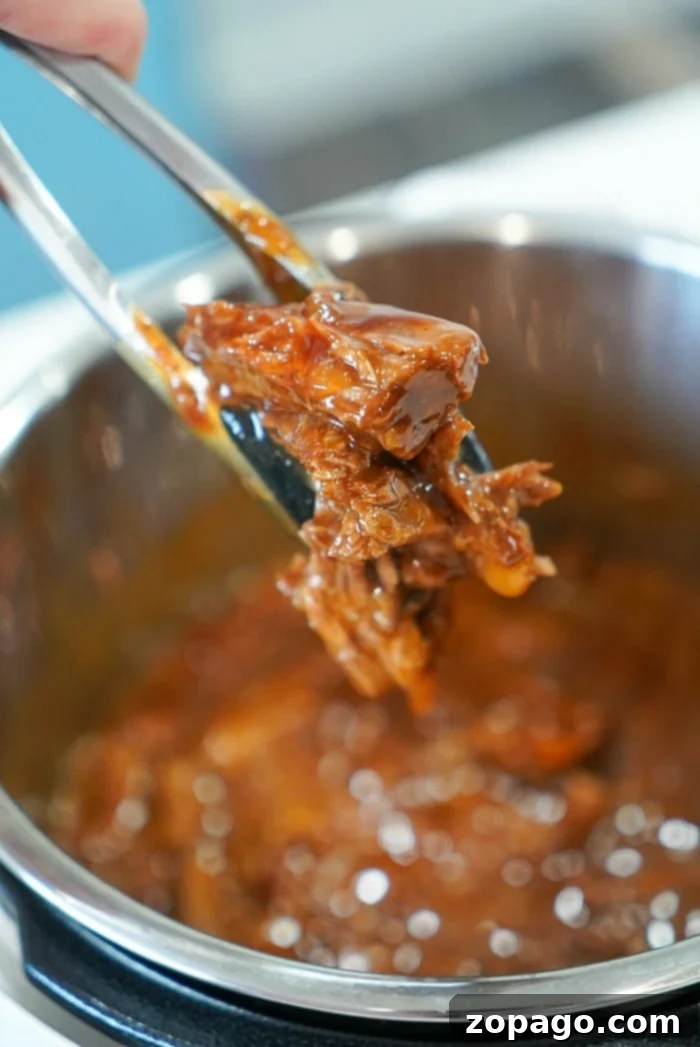 Tender Instant Pot BBQ Beef 12 BBQ beef - versatile Instant Pot meal for various dishes