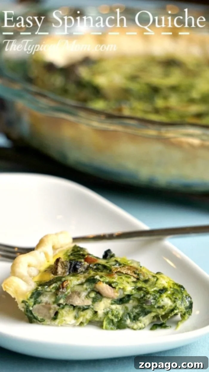 No-Fuss Spinach Quiche 7 A vibrant, golden-crusted easy spinach quiche cooling on a wire rack, freshly baked.