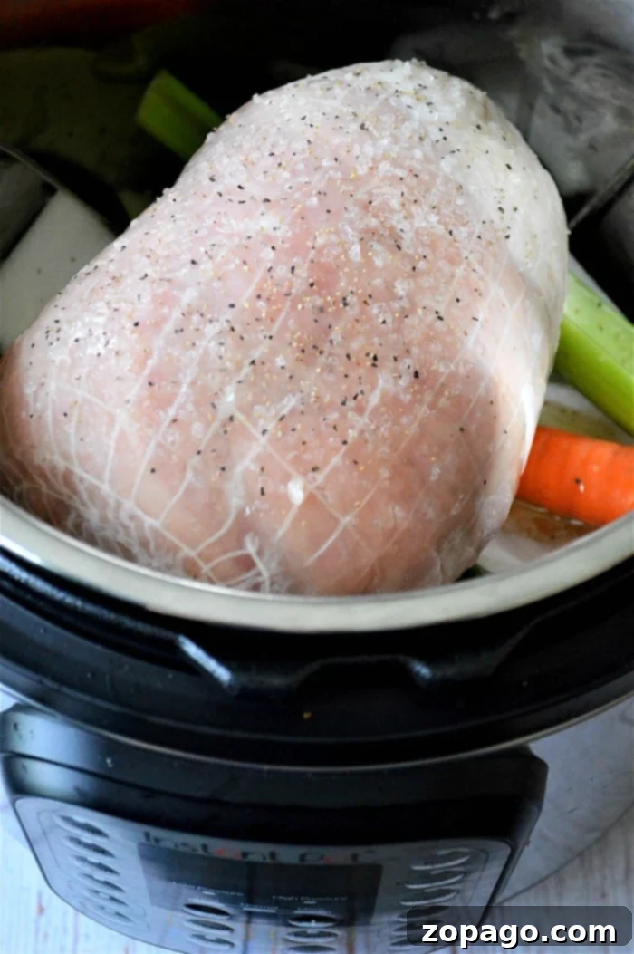 Preparing a frozen turkey breast in the Instant Pot is straightforward and delivers impressive, consistently delicious results.
