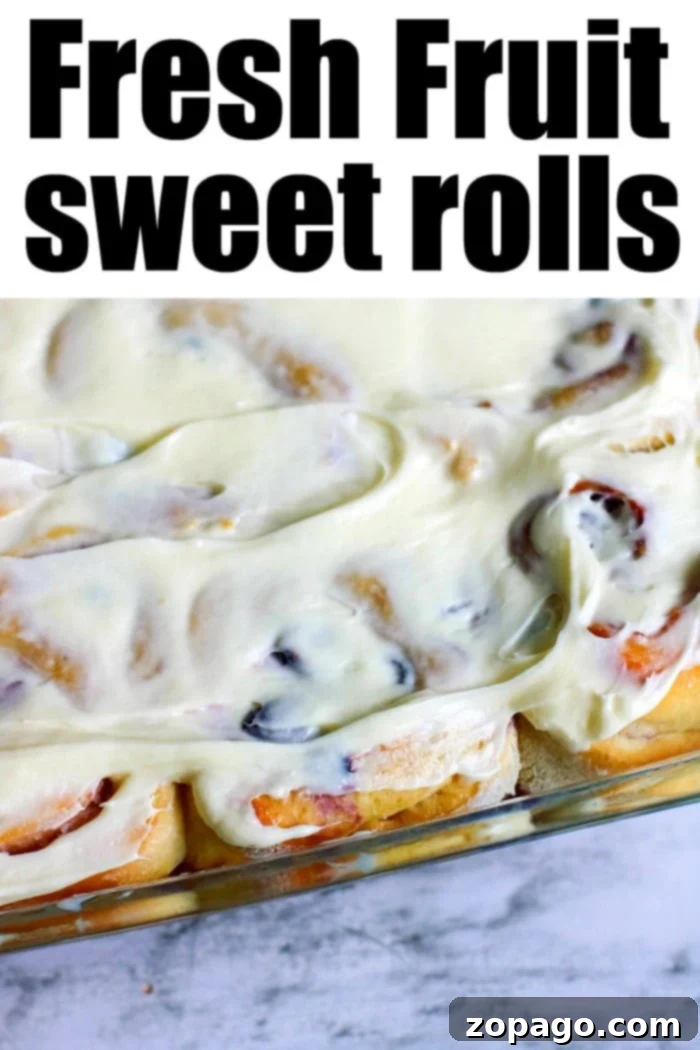 Huckleberry Delights 11 A beautiful stack of golden-brown huckleberry sweet rolls, generously drizzled with a sweet glaze and meticulously arranged on a serving plate.