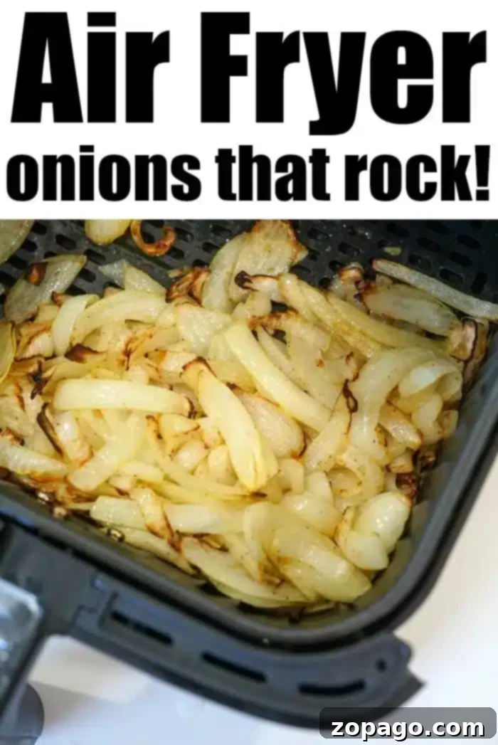 Golden Crisp Air Fryer Onions 9 A close-up of air fryer onions inside a basket. The text at the top reads "Air Fryer onions that rock!" The onions are lightly browned and look ready to eat.