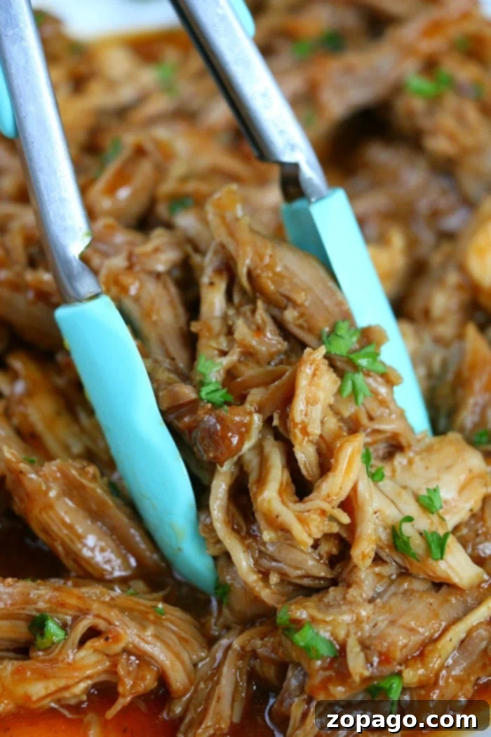 Ninja Foodi Pulled Pork 8 Close-up of a generous serving of Ninja Foodi pulled pork, perfect for a hearty meal.