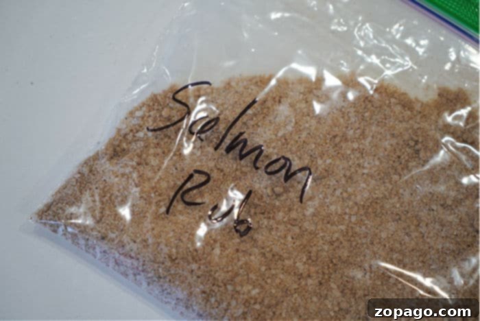 Zesty Herb Salmon Rub 5 A salmon fillet beautifully seasoned with a homemade dry rub, perfectly prepped and ready for baking or grilling.