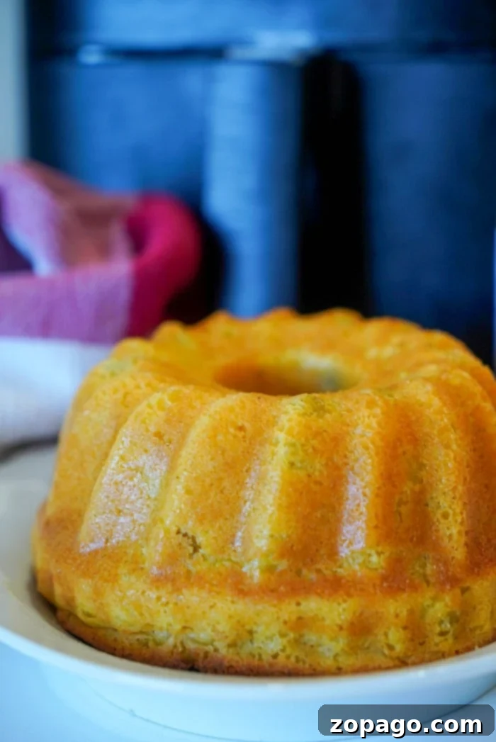Perfect Air Fryer Cornbread 5 Close-up of fluffy cornbread in a bundt pan, fresh out of the air fryer
