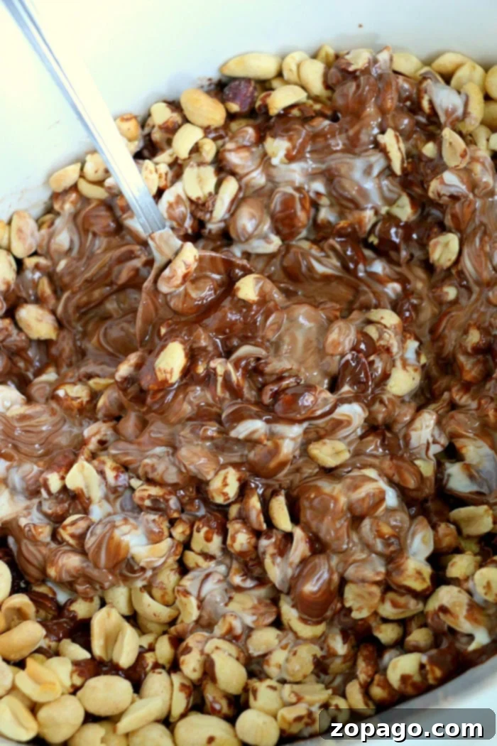 Slow Cooker Peanut Delights 6 Finished slow cooker Peanut Clusters cooling on parchment paper, arranged neatly