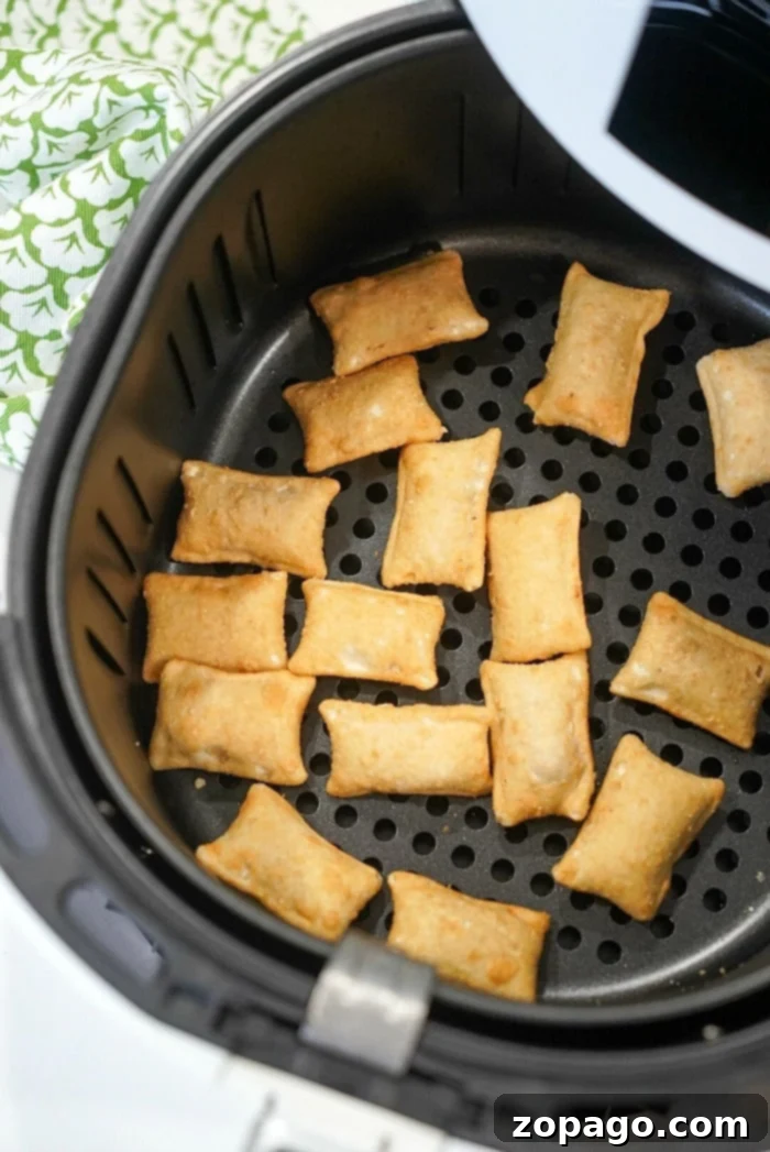 Crispy Air Fryer Pizza Bites 4 Close up of air fryer pizza rolls