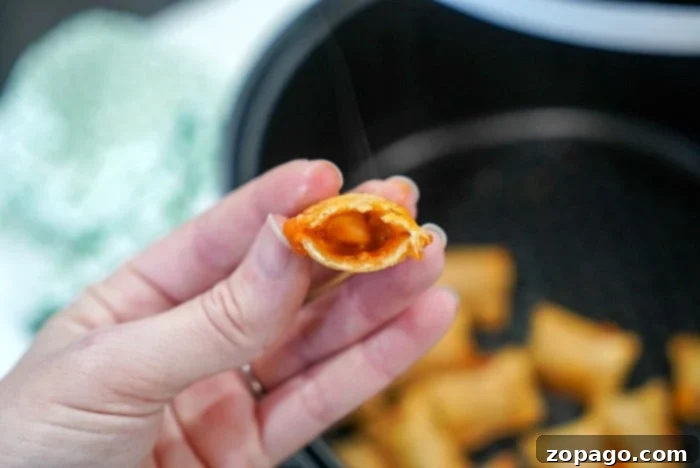 Crispy Air Fryer Pizza Bites 5 Delicious pizza rolls in a bowl
