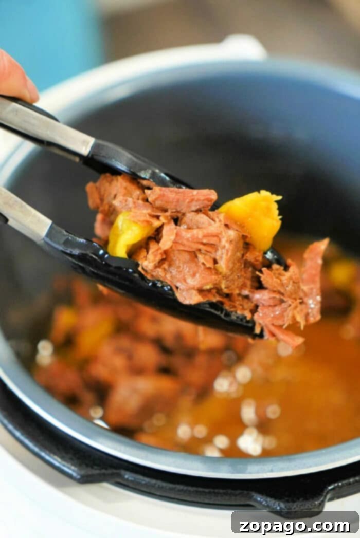 Instant Pot Mississippi Roast 2 Instant Pot Mississippi Roast recipe with tender shredded beef and rich gravy
