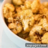 Effortless Cosori Air Fryer Creations 17 Air-Fryer-Cauliflower florets seasoned and cooked to a golden crisp.