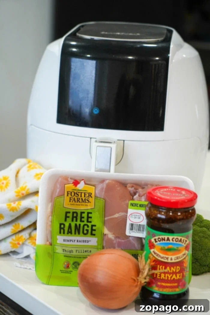 Sticky Sweet Air Fryer Teriyaki Chicken 4 Close-up of cooked teriyaki chicken in an air fryer basket
