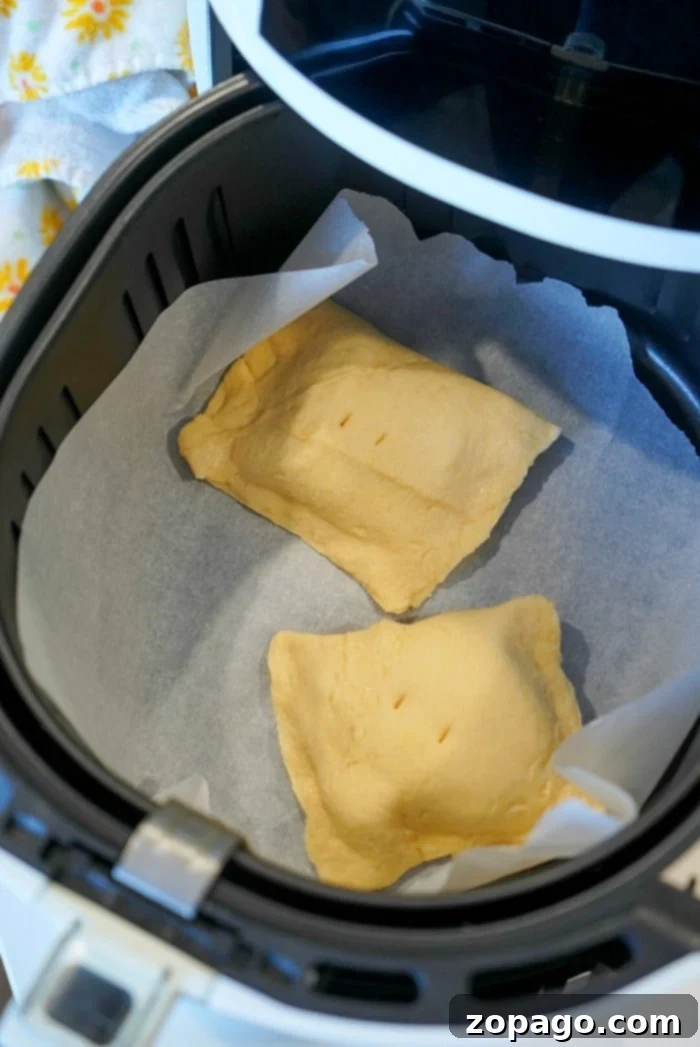 air fryer hand pies drizzled with icing