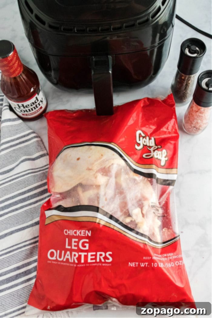 Cooked Air Fryer Chicken Leg Quarter glistening with barbecue sauce.
