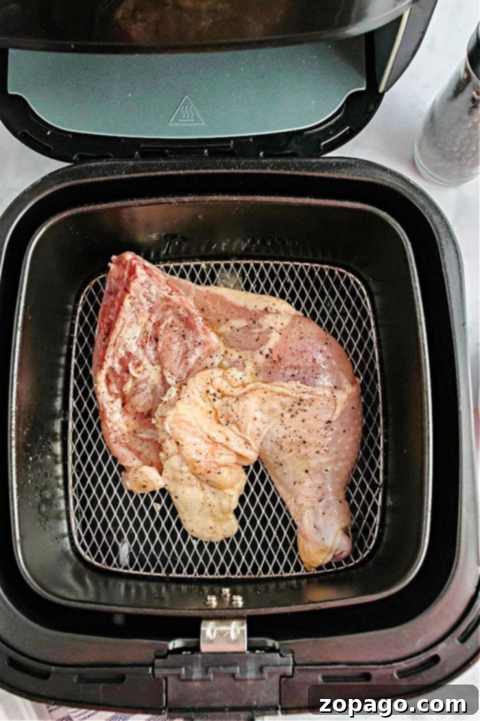 Crispy Air Fryer Chicken Leg Quarters 5 Crispy Air Fryer Chicken Legs, perfectly browned and ready to serve.