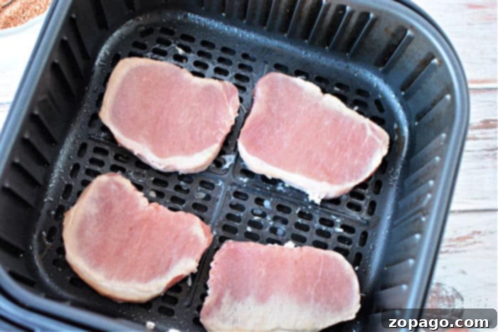 No Thaw Air Fryer Pork Chops 6 Seasoned frozen pork chops ready for cooking in the air fryer.