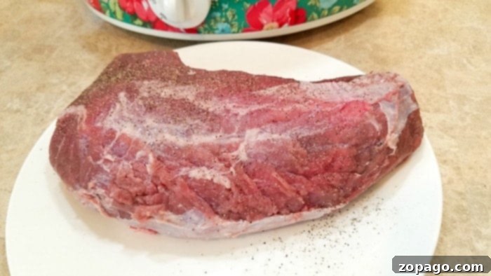 Slow Cooker Frozen Roast 4 Close-up of a raw chuck roast, ready for slow cooking.