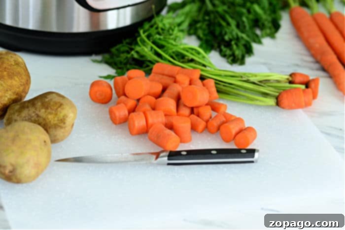 Simple Instant Pot Potatoes and Carrots 4 sliced carrots prepared for pressure cooking