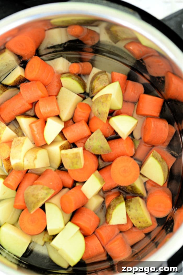 Simple Instant Pot Potatoes and Carrots 8 instant pot carrots and potatoes in serving bowl