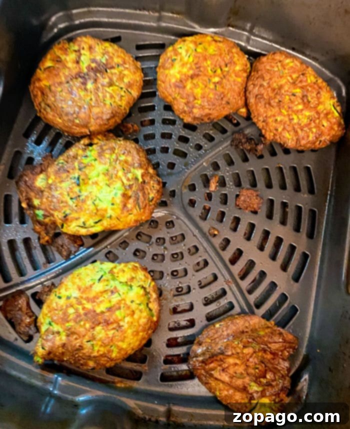 Crispy Air Fryer Zucchini Fritters 7 Delicious low carb zucchini fritters served with a creamy dip
