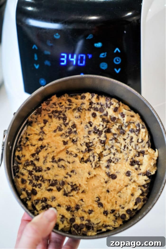 Warm Gooey Pizookie Bliss 5 A perfectly baked air fryer Pizookie, golden brown and ready for toppings.