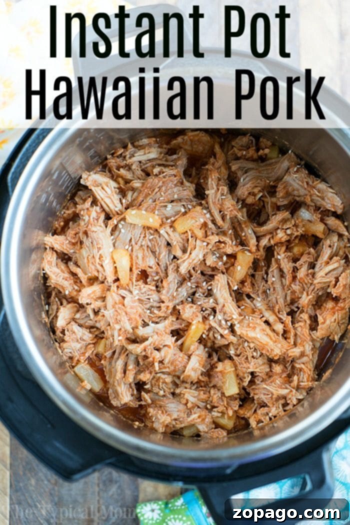 Tender Instant Pot Pork Shoulder from Frozen 9 Instant Pot Hawaiian pulled pork, garnished with green onions.