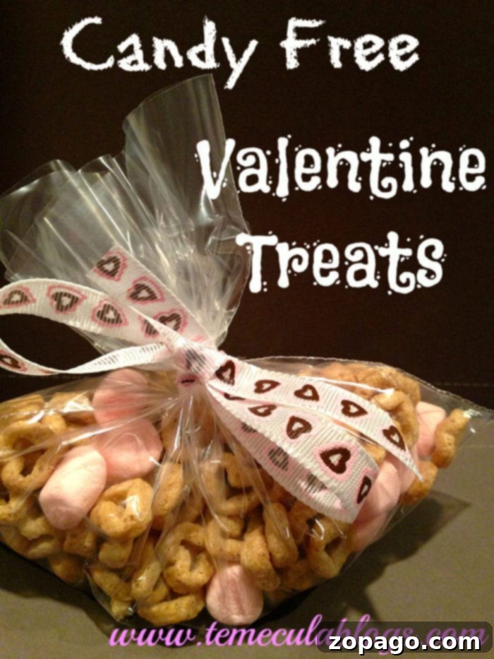 Sweet Valentine Surprises: Free Tags and Treats for Kids 2 Easy and healthy Valentine's Day treat using Quaker Whole Hearts cereal and pink marshmallows, perfect for kids.