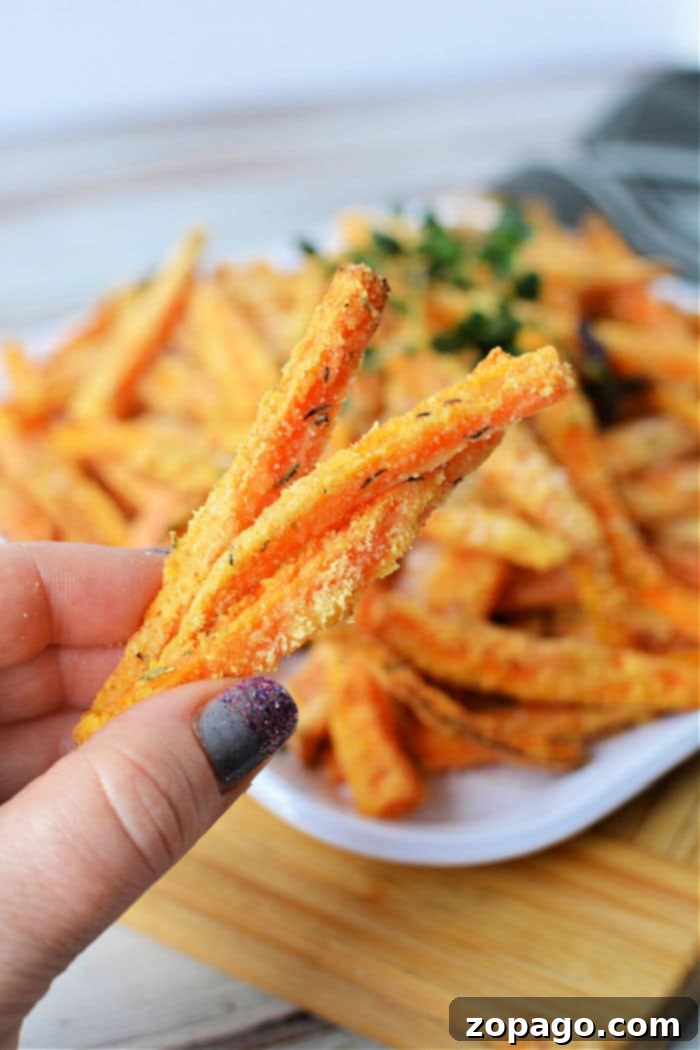 Sweet and Crispy Air Fryer Carrot Sticks 2 Crispy Air Fryer Carrot Fries on a plate