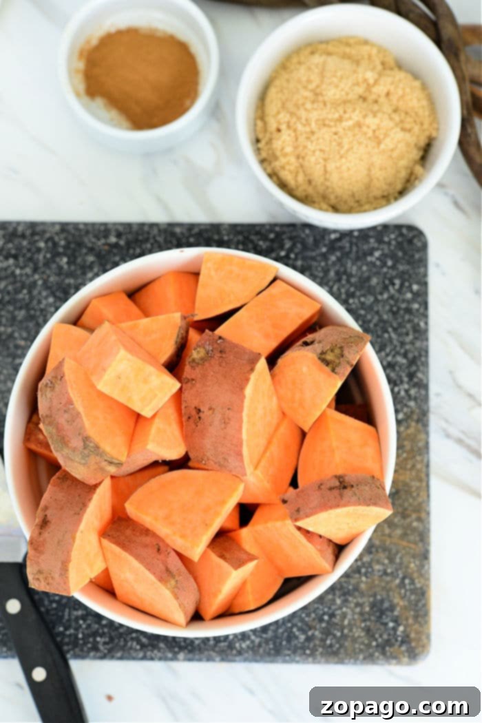 Crispy Air Fryer Sweet Potatoes 5 Precisely cut sweet potato cubes, dried and ready for seasoning.