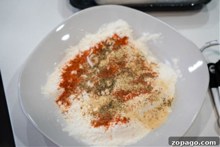 Ingredients for breading fish nuggets: flour and eggs in bowls.