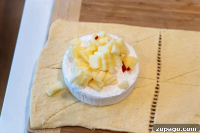 Cheese A Universe of Flavors 8 Baked brie with honey and nuts, a perfect appetizer.