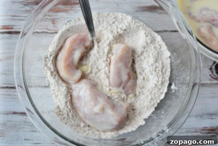 Crispy Air-Fried Chicken Breast 4 Buttermilk soaked chicken pieces ready for breading for air fryer fried chicken recipe