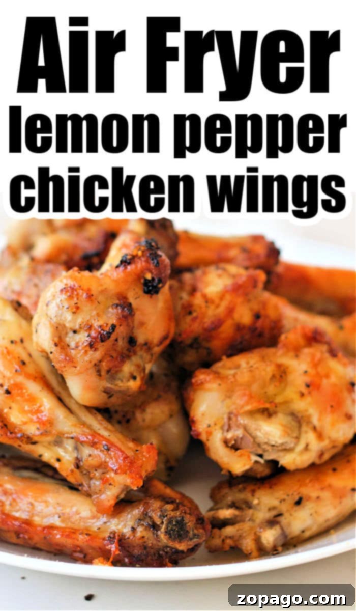 Crispy Air Fryer Lemon Pepper Wings 6 A plate of golden brown wings, seasoned to perfection, proudly displaying "Lemon Pepper Chicken Wings Air Fryer"