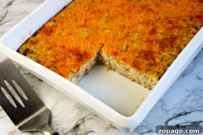 Cheesy Grits Bake 8 Sausage Casserole with eggs and cheese, baked to perfection.