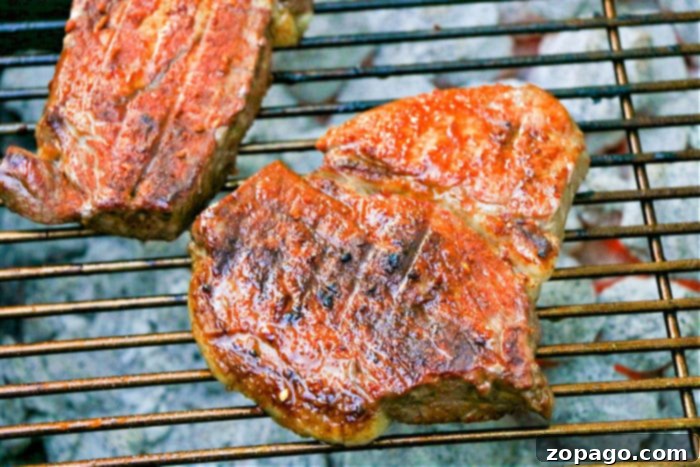 Achieving Perfect Steak Temperature 7 grilled steak with charcoal