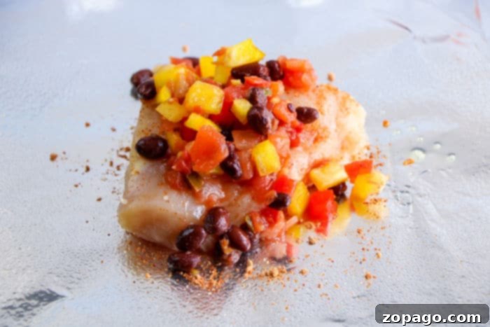 Easy Grilled Dinners 5 Grilled foil packets cooking on a barbecue