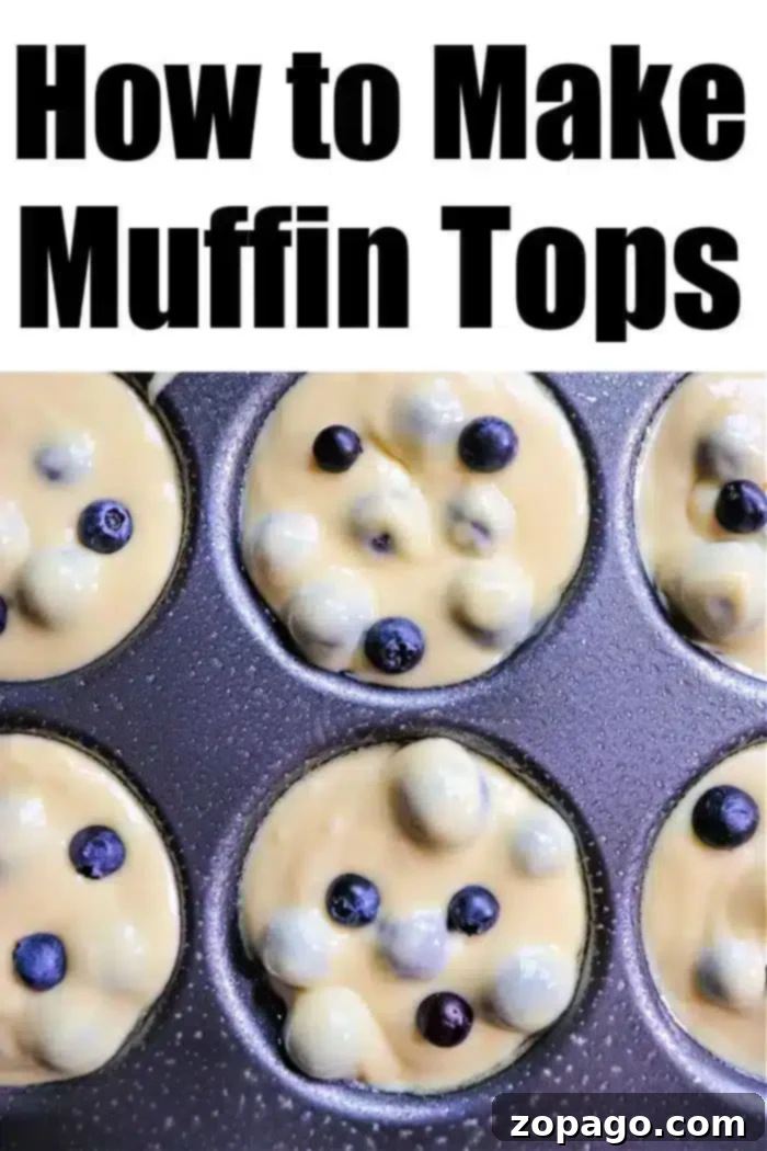 Just the Tops: Blueberry Muffin Perfection 6 An overhead view of luscious blueberry muffin batter, studded with fresh blueberries, ready for baking in a muffin top tray, accompanied by the text "How to Make Blueberry Muffin Tops."