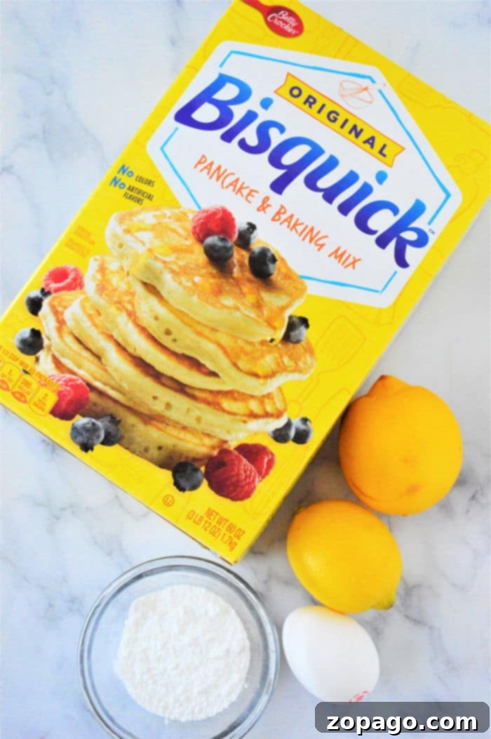 Simple & Fluffy Bisquick Muffins 4 Bisquick Muffins recipe with lemons and powdered sugar.