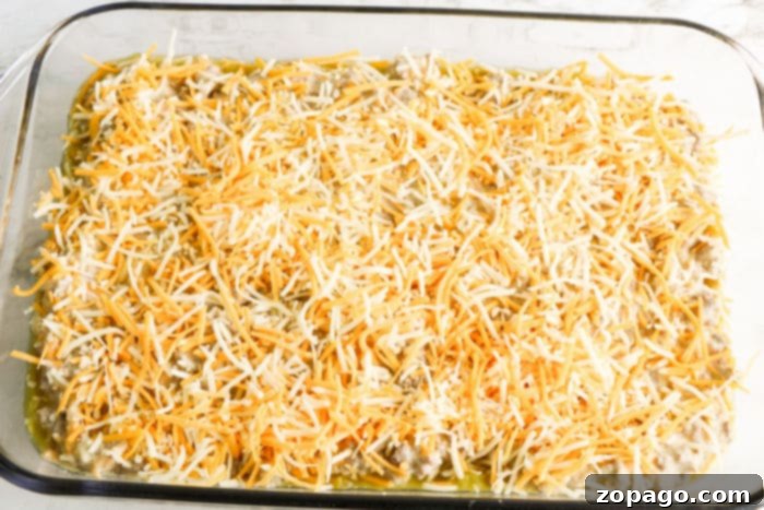 Cheesy Chile Relleno Bake 5 Chile Relleno Casserole with melted cheese, ready for serving