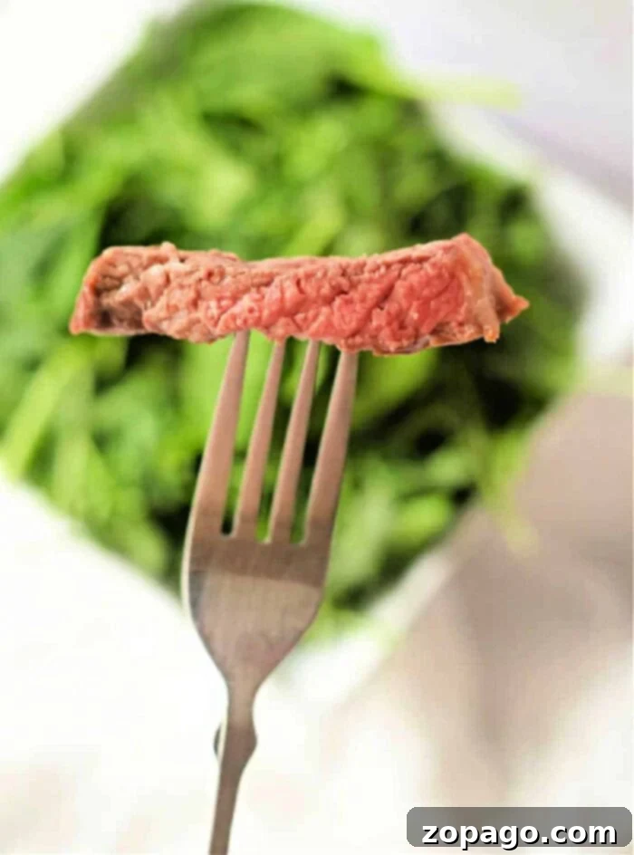 Perfect Air Fryer Ribeye 7 How to cook ribeye in air fryer, showing a perfectly raw ribeye steak.